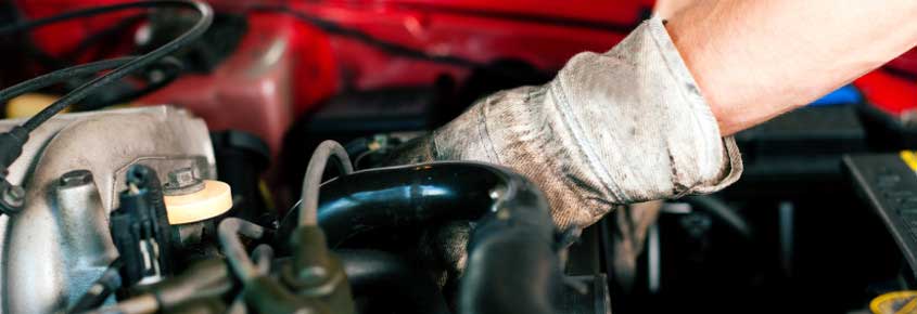 Mechanic working on vehicle